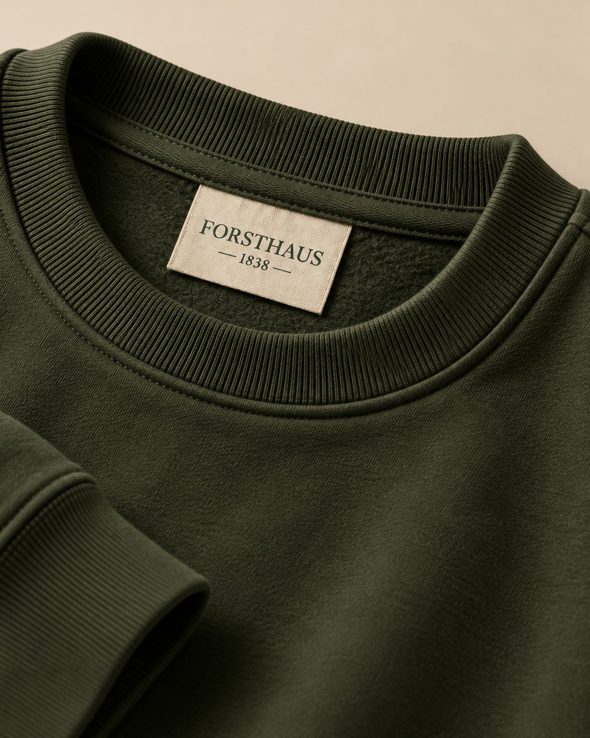 Pullover Stammgast, Detail des Kragenetiketts Forsthaus 1838